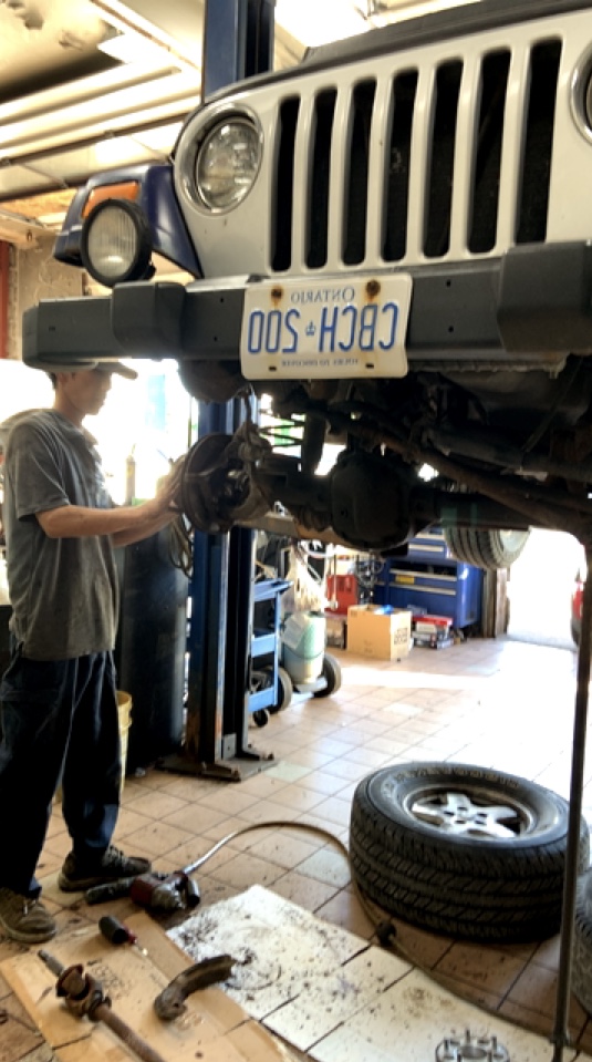 Vehicle underside work in progress on the shop floor